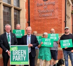 Councillors Tim Walker and Andy walker (front of picture), outside County Hall with Co-Ordinator Stewart Arnold and local members. 